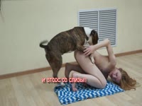 Beautiful naked blonde getting penetrated by dog's cock